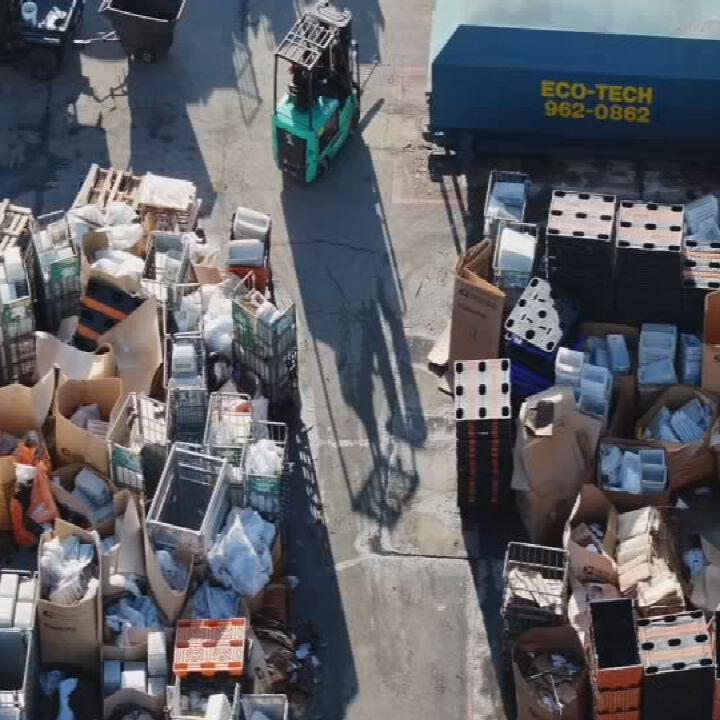 USPS delays-Gardiner Lane Louisville Regional Post Office drone-Packages piled up